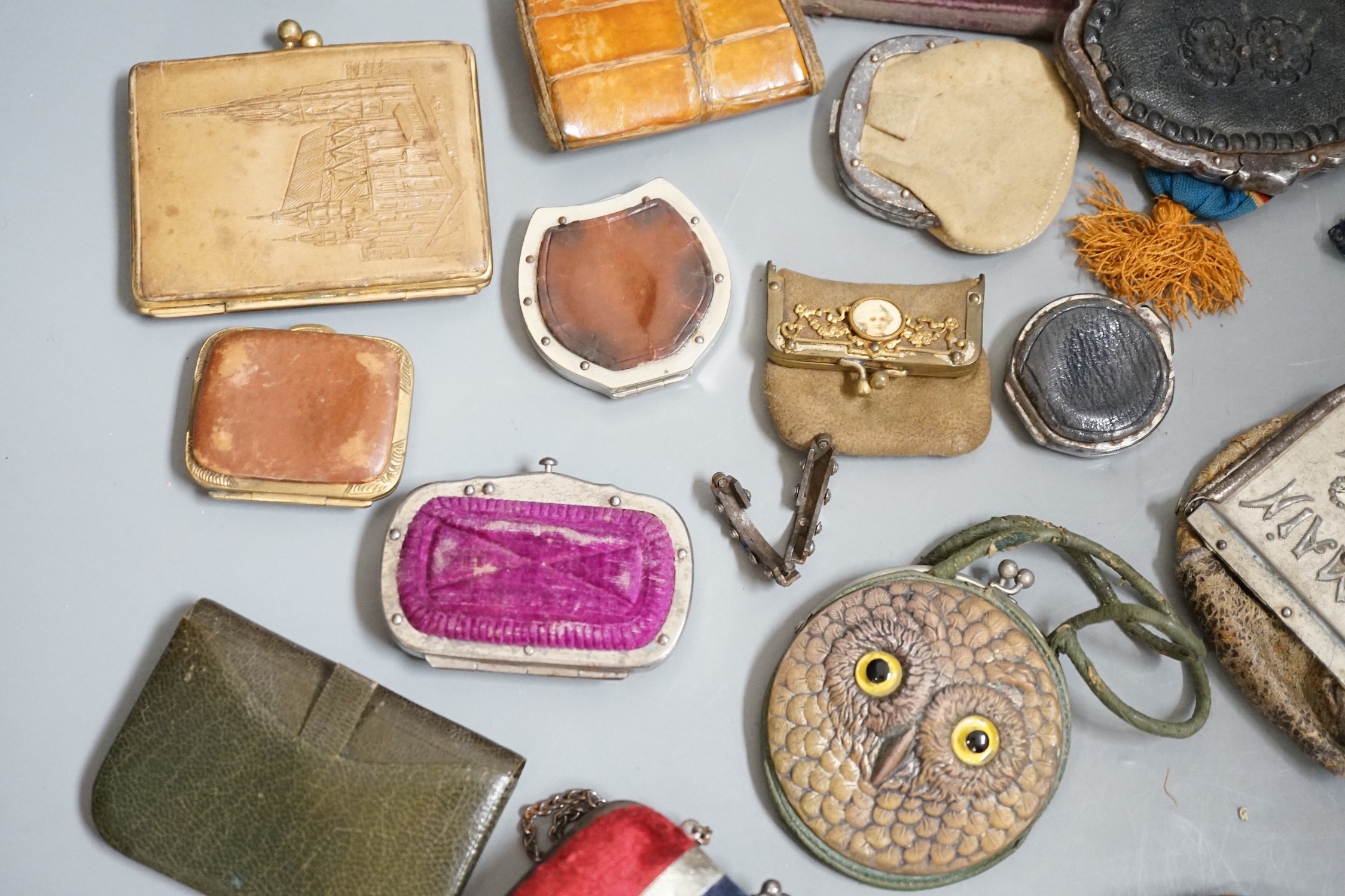 Mixed collection of mainly 19th century leather purses of various sizes and shapes, including two novelty ‘owl’ purses, a horse shoe shaped silver framed purse, cut steel purses, approx 39 in total